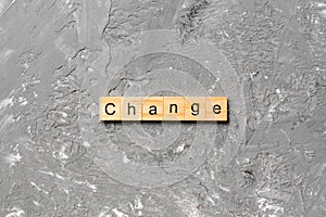 CHANGE word written on wood block. CHANGE text on cement table for your desing, concept