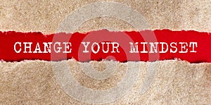 Change Your Mindset text written under torn paper