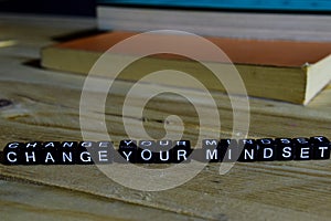 Change your mindset on wooden blocks. Motivation and inspiration concept