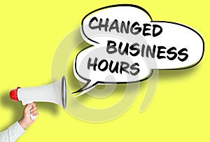 CHANGED BUSINESS HOURS poster or sign with megaphone and speech bubble photo