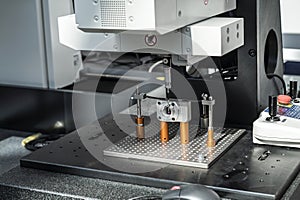 Changer racks and probe modules. Probe material stylus close-up process