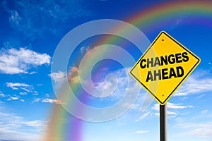 Changes Ahead Sign With Rainbow Background