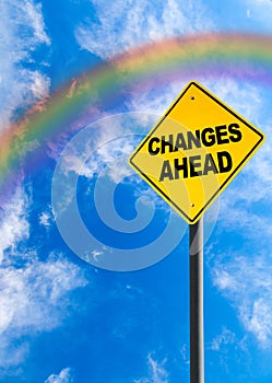 Changes Ahead Sign With Rainbow Sky and Copy Space