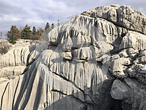 Changes, sharpness, formations, crevices, corrugated and sharp structures in stones