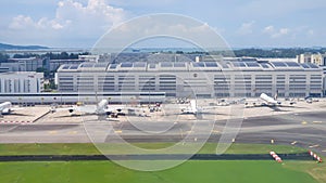 SATS Airfreight Terminal And Commercial Airplane At Changi Airport, Singapore.