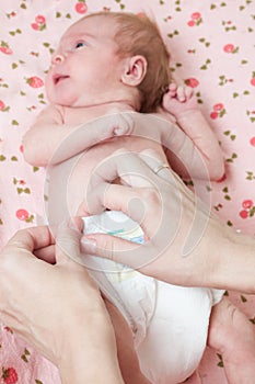 Changing a baby's diaper