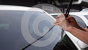 Changing car window rubber for wipers prepare for rainy and winter season safety