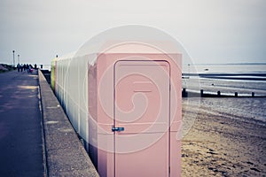Changing cubicles on the beach