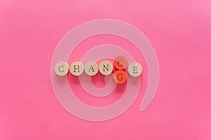 Changing the word Change into Chance over pink background