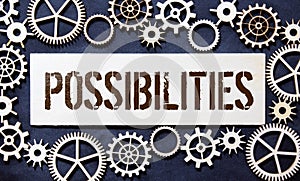 Changing the word impossible to possible with a pencil eraser