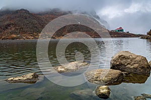 Changu Lake Lake Tsomgo East Sikkim, on a foggy winter morning.