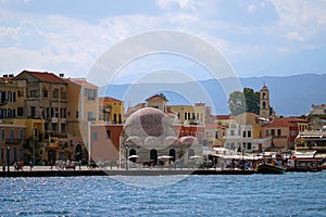 Chania, Crete, October 2018, Panoramic view of the waterfront of the city of Xania with the mosque photo