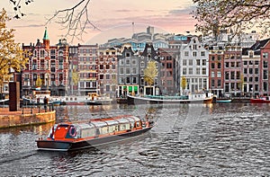 Channel in Amsterdam Netherlands houses river Amstel