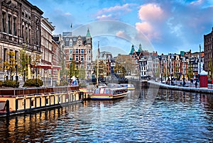 Channel in Amsterdam Netherlands houses river Amstel