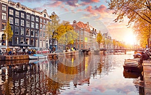 Channel in Amsterdam Netherlands houses river Amstel photo