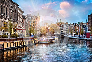 Channel in Amsterdam Netherlands houses river Amstel photo