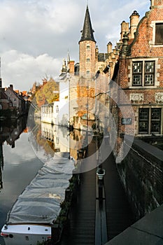 The channel is surrounded by old stone houses