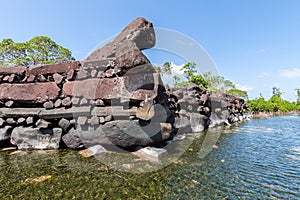 A channel and town walls in Nan Madol - prehistoric ruined stone city. Pohnpei, Micronesia, Oceania.