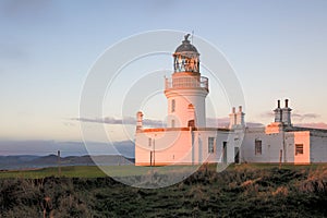 Chanonry Lighthouse on the Black Isle on the mouth of River Ness at sunrise, Inverness, Scotland