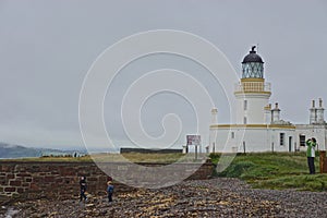 Chanonry Point, Scotland: A family at the Chanonry Point Lighthouse