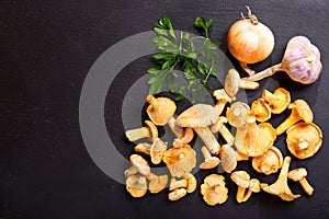 Chanterelle mushrooms with fresh vegetables for cooking