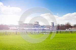 Chantilly racecourse with stands at sunny day