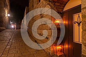 Chanuka lights on old jerusalem city street photo