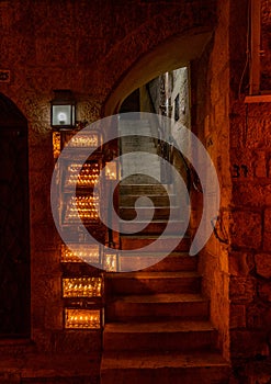 Chanuka lights on old jerusalem city street photo