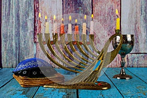 Chanukah candles all a jewish symbol with kosher wine celebration and kipah photo