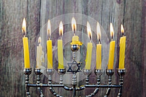 Chanukah candles all in a row. Bright, shiny the Jewish holiday.