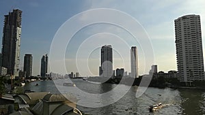 Chao phraya river view in the evening , travel by passenger ship the waterways of Bangkok Thailand