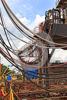 Chaos of hoses, pipelines and cables