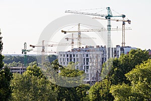 Chaotic buildings in Kiev. Destruction of green forest park areas