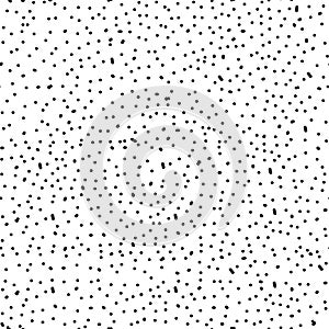 Chaotic Polka Dots Seamless Pattern. Vector painted background from small rounds. Abstract white and black pattern for