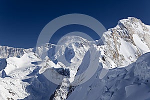 Chapaev peak and North mountainside of peak Pobeda (Jengish Chokusu in Kyrgyz, or Tomur in Chinese), Central Tian Shan mountains