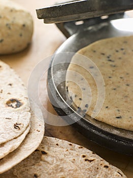 Chapatti Press with Chapatti Breads