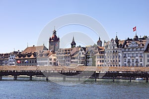 Chapel Bridge. Buildings of old city of Luzerne and KapellbrÃ¼cke, wooden bridge over the Reuss River. Swiss Cityscape.