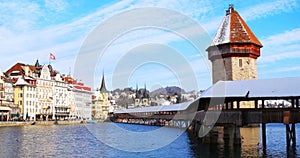 Chapel Bridge - a famous landmark in Lucern, Switzerland during the sunny day