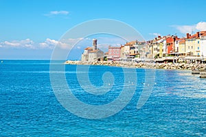 Chapel and colorful houses on the pier, Piran, Slovakia, Europe