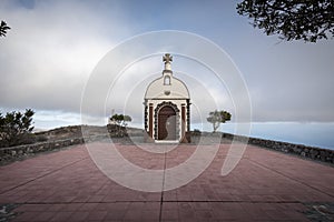 Chapel on a hill at sunset