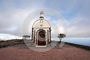 Chapel on a hill at sunset