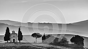 The chapel of the Madonna di Vitaleta in black and white at the first light of the day, San Quirico d`Orcia, Tuscany, Italy