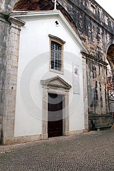 Chapel of Our Lady Of Monserrate in one of the stone arches of the Aguas Livres Aqueduct, in Amoreiras Garden, Lisbon, Portugal