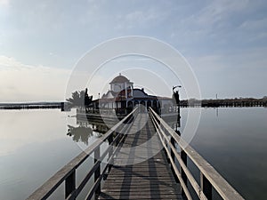 The chapel of Panagia Pantanassa on quiet Vistonida lake in the morning sun.