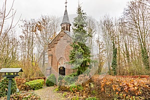 Chapel of St. Anna St. Annakapel with its brick walls and a small tower among bushes