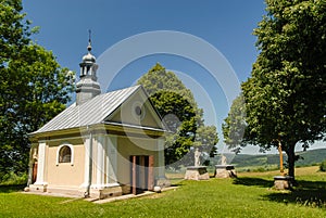 A chapel surrounded by fields and forests, Kalwaria PacÅ‚awska, Poland