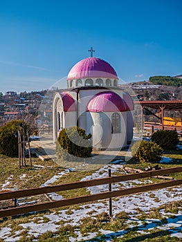 Chapel or tabernacle with pink purple dome. Saint Peter and Pavel. photo