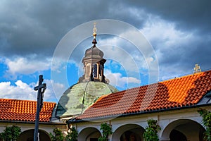 Chapel tower, cross and ambit in monastery Klokoty photo