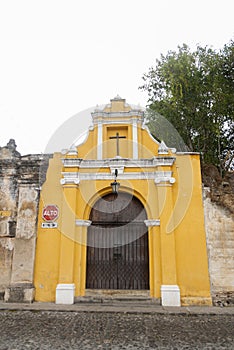 Chapel  Way of the Cross stations in street of thesteps of La Antigua Guatemala. Antique door in antigua Guatemala.