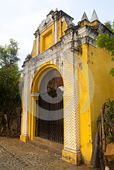 Chapel  Way of the Cross stations in street of thesteps of La Antigua Guatemala. Antique door in antigua Guatemala.